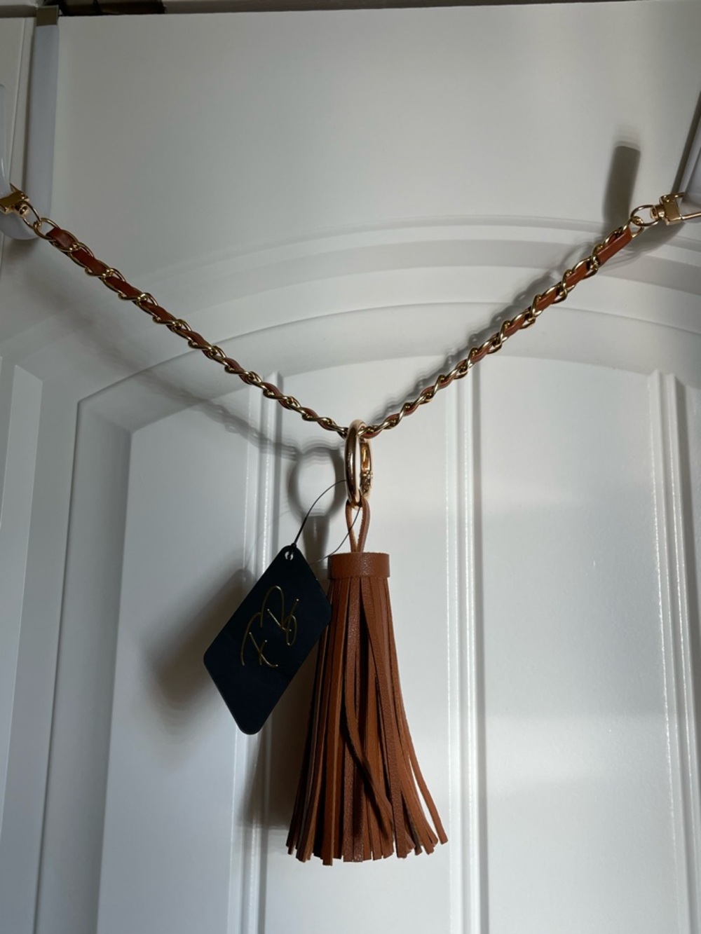 Brown NB Leather Tassel Bagcharm with Gold Chain Chain